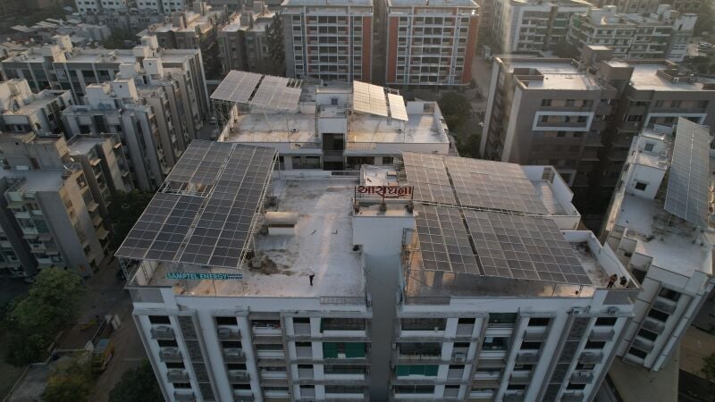 Solar rooftop system installation on residential building in Ahmedabad