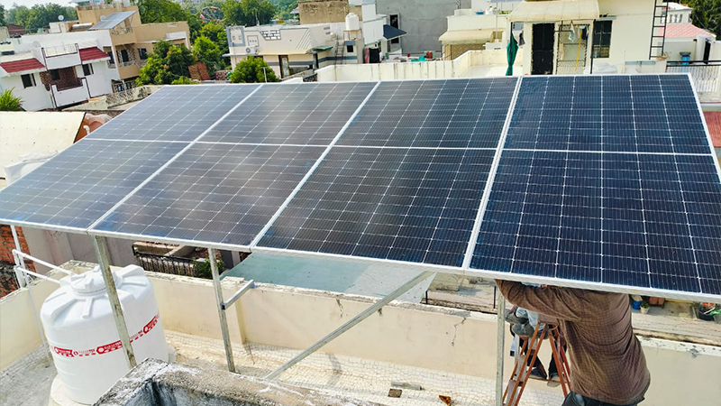 Flat roof solar panel setup for residential building in India